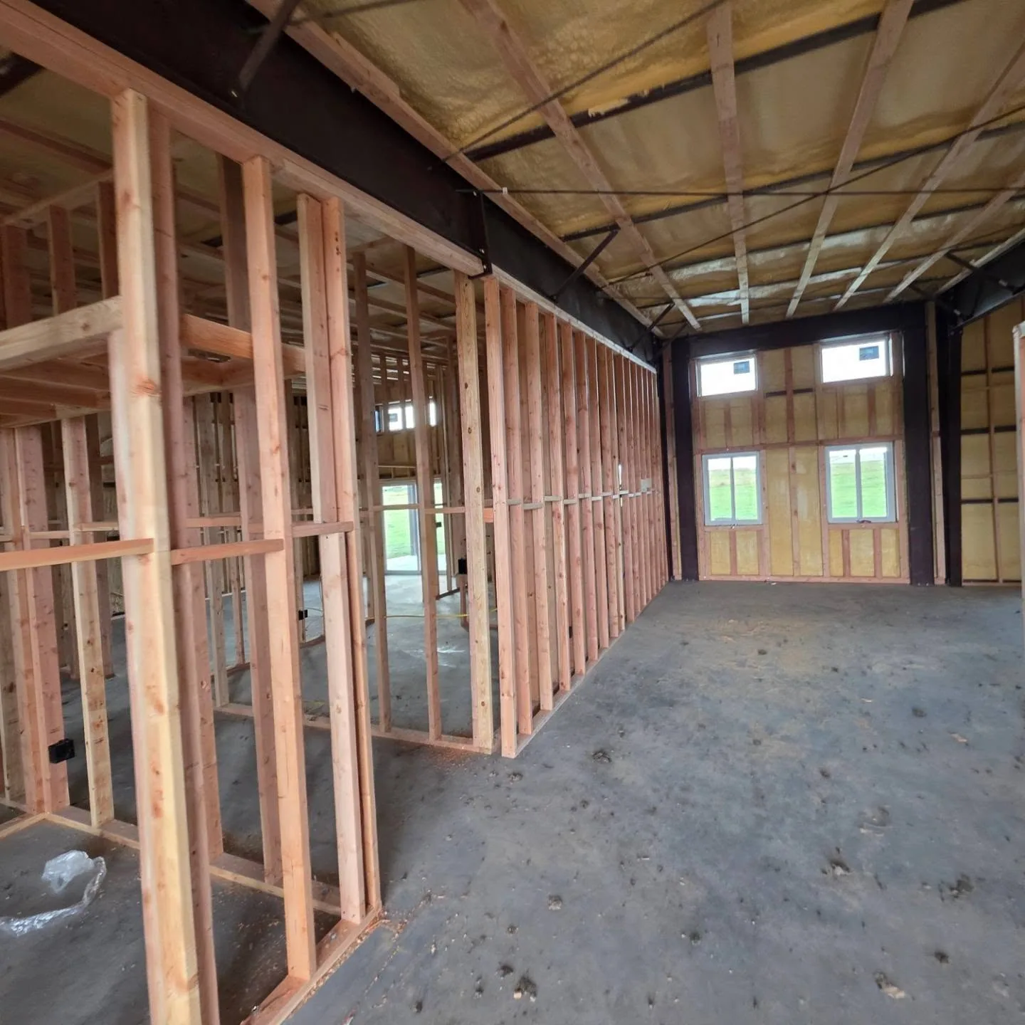 Four window end wall spray foam steel building