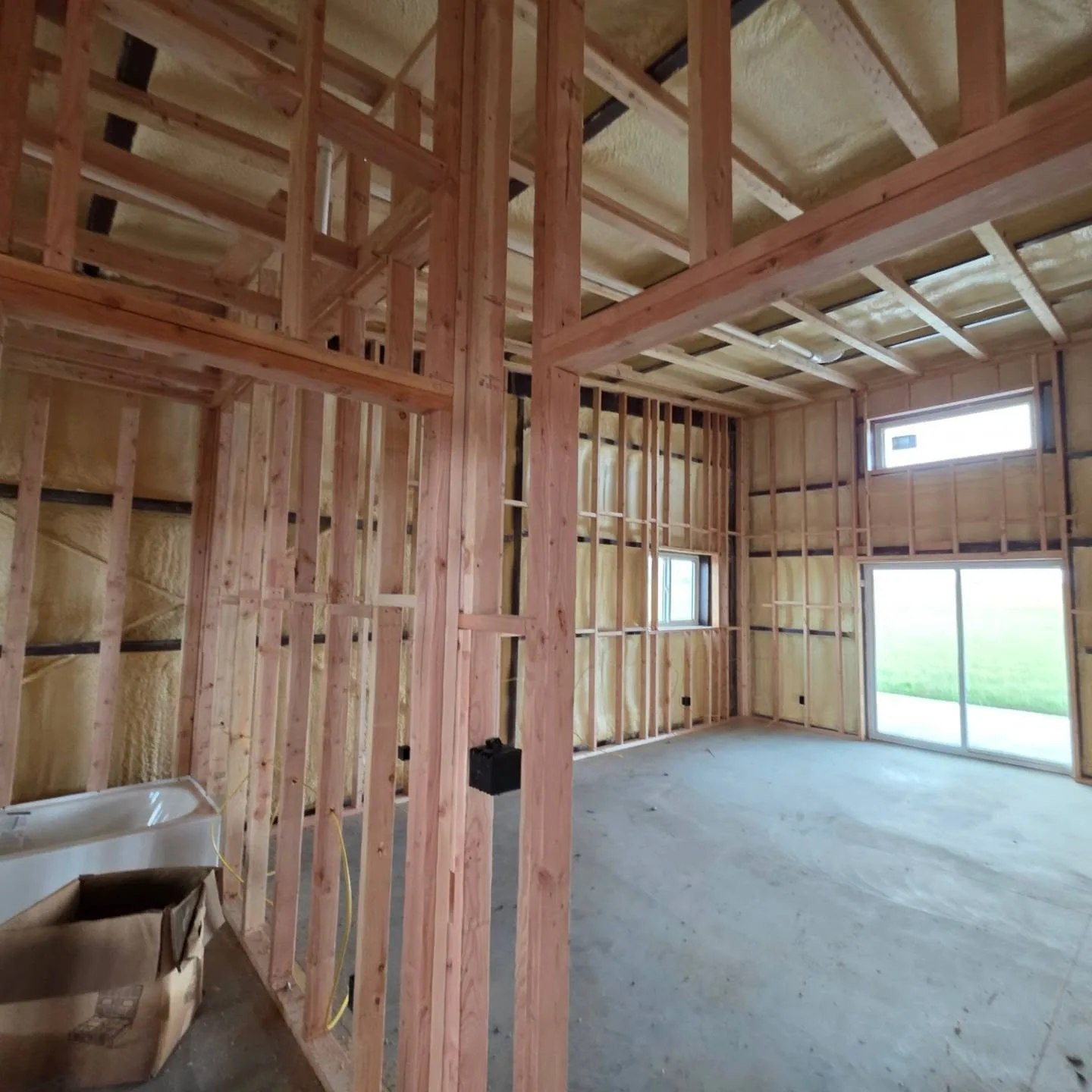 Framed living quarters sliding patio door bathtub