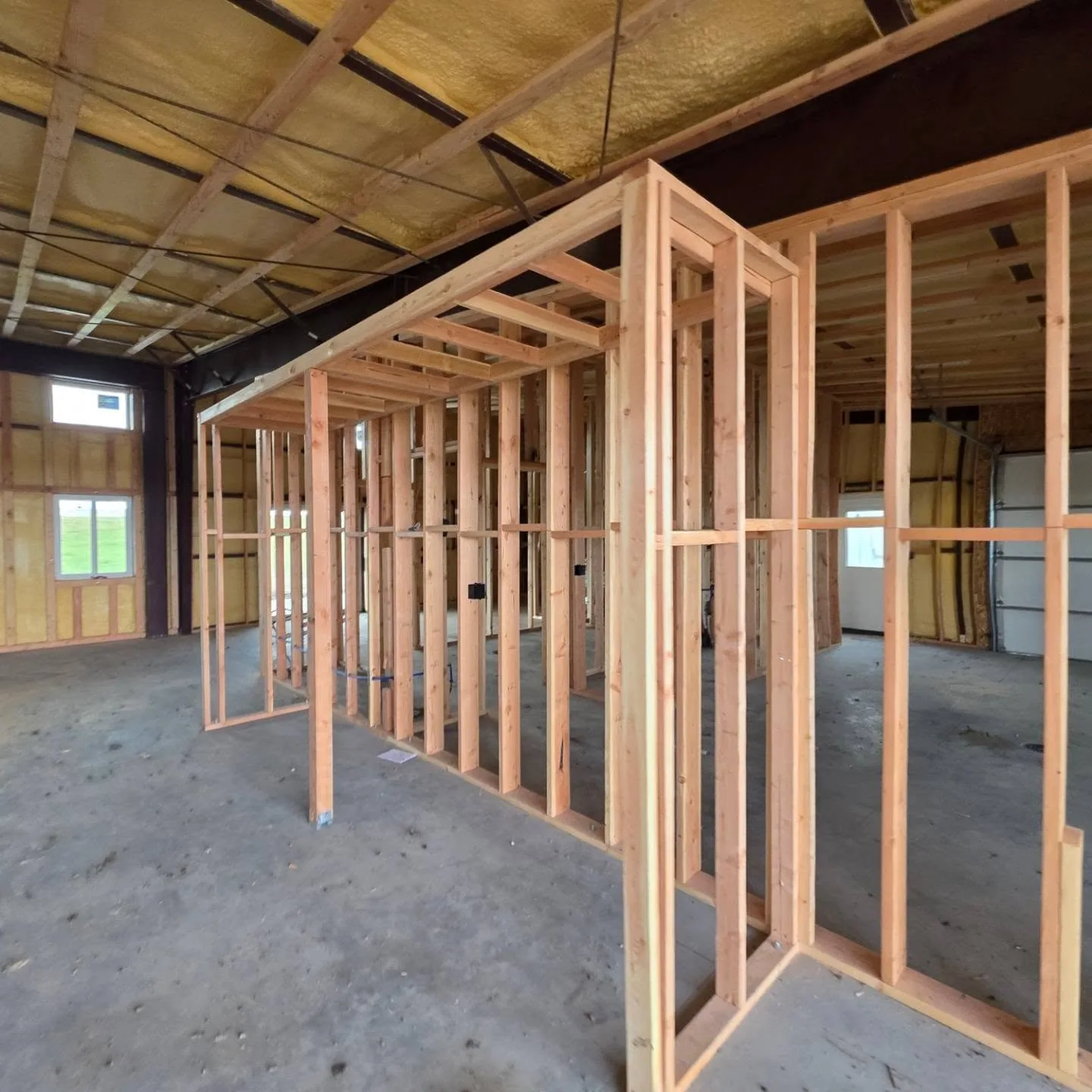 Lumber framed interior room under spray foam roof
